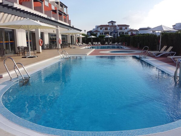 2 outdoor pools, pool umbrellas, pool loungers