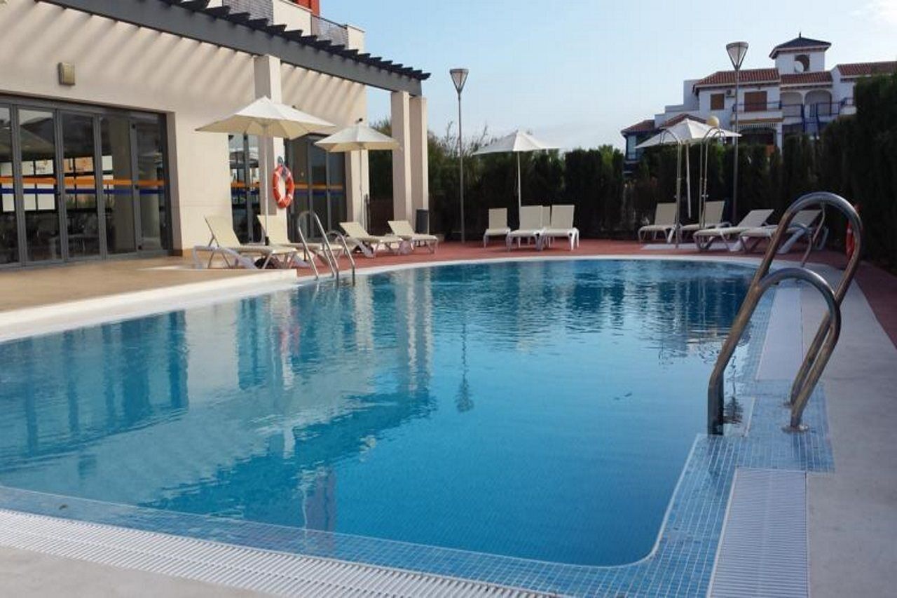 2 outdoor pools, pool umbrellas, pool loungers