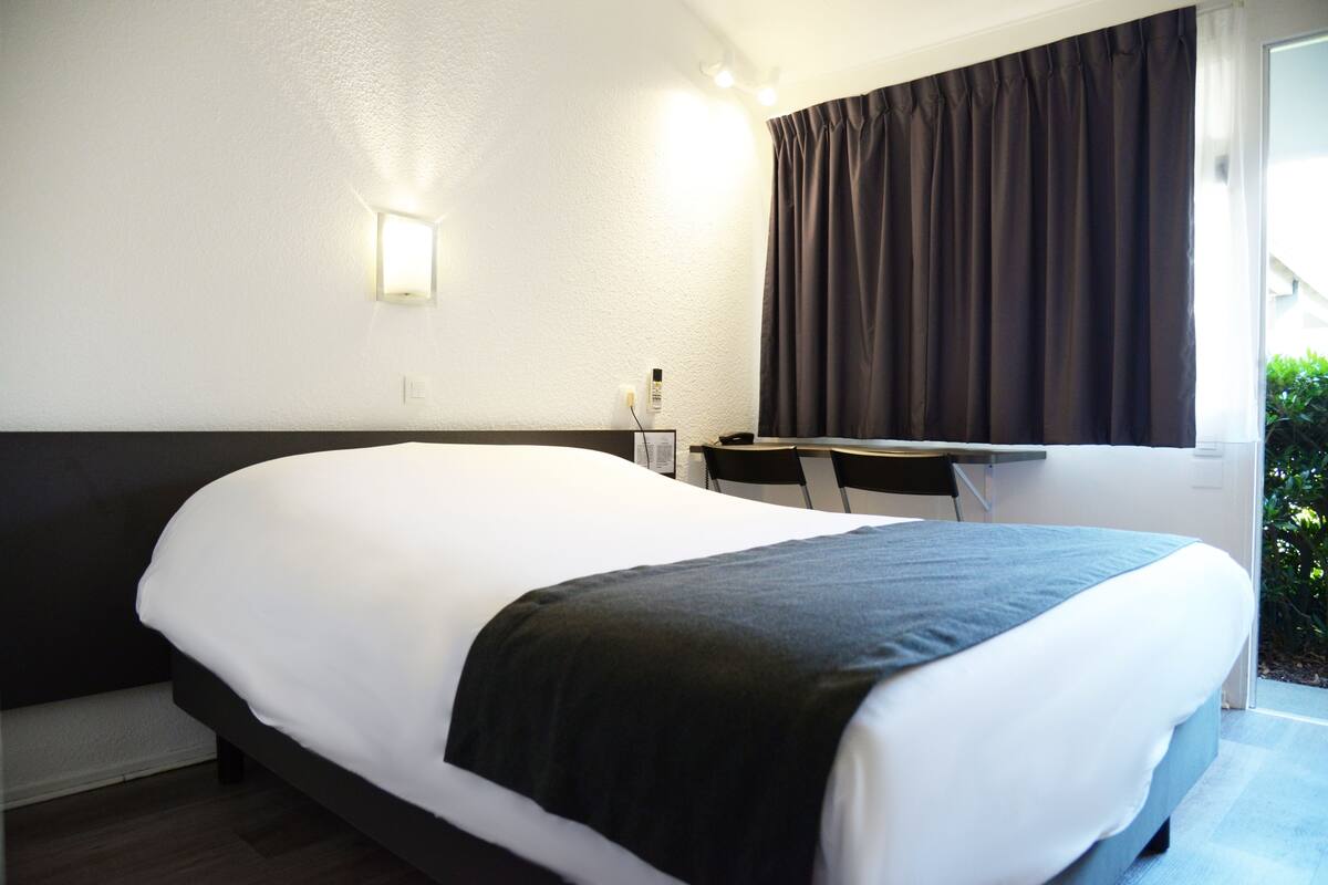 Premium bedding, desk, iron/ironing board (on request), free WiFi