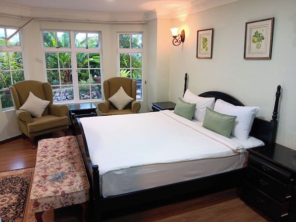 Habitación Deluxe | Cunas, wifi gratis y ropa de cama 