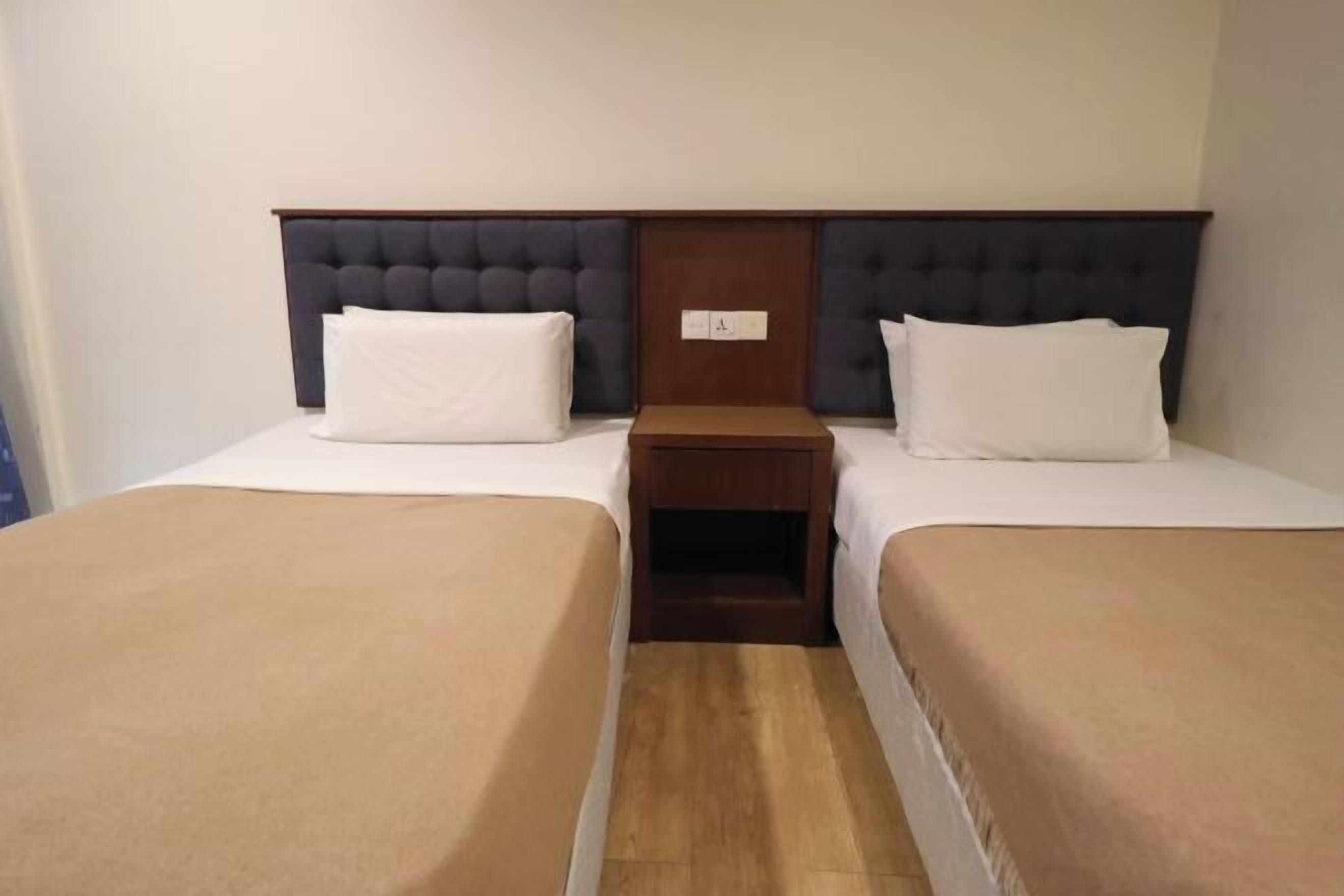 Coffres-forts dans les chambres, fer et planche à repasser