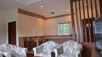 Apartment, 3 Bedrooms | Living area | 32-inch flat-screen TV with satellite channels, LCD TV