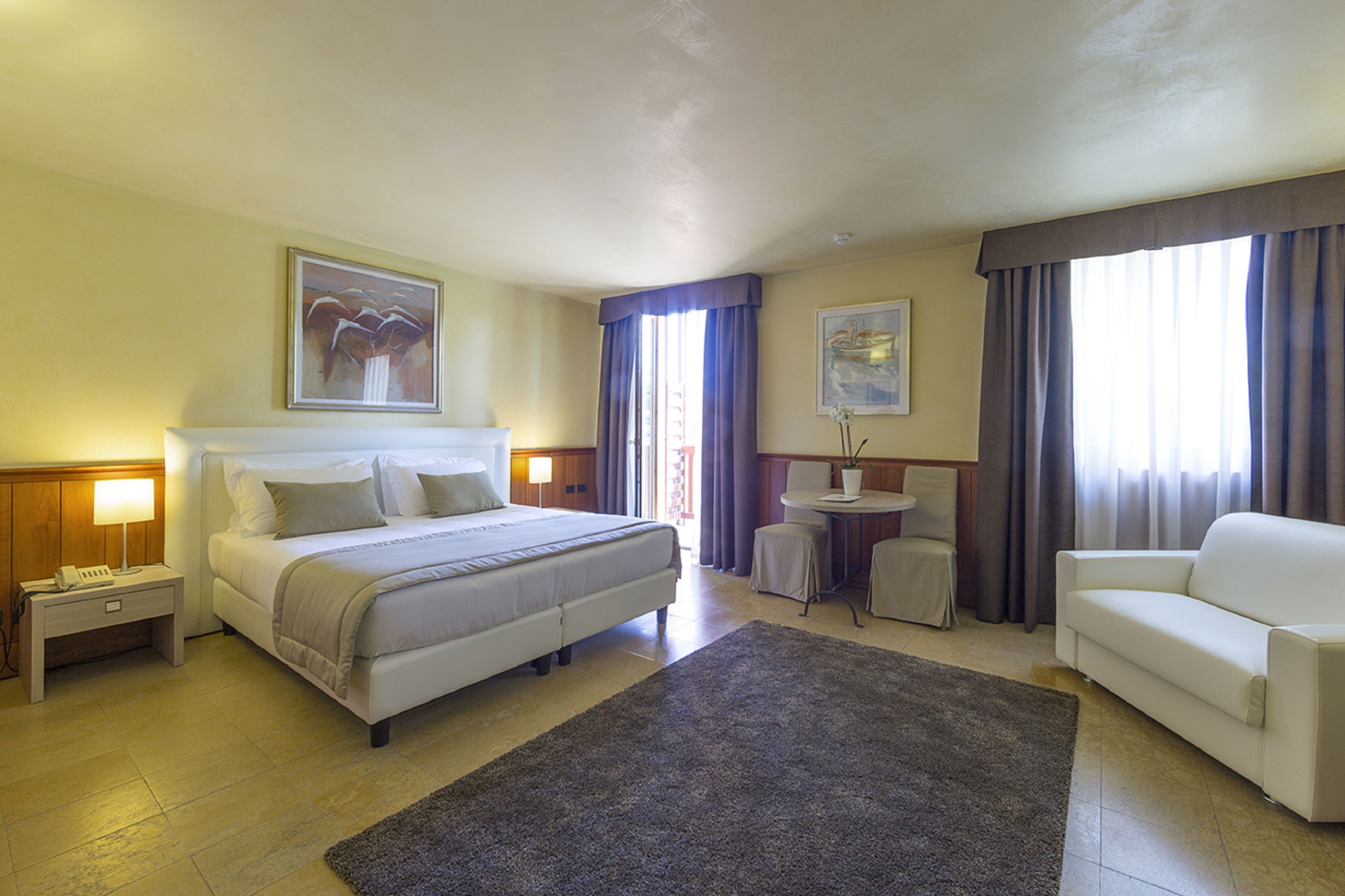 Down comforters, minibar, in-room safe, desk