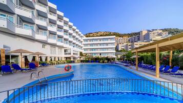 Seasonal outdoor pool, pool umbrellas, pool loungers