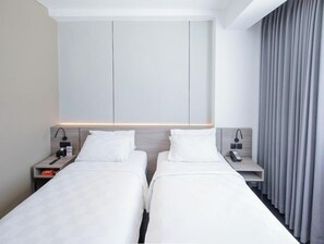 Phòng 2 giường đơn Deluxe | Bộ đồ giường cao cấp, minibar, két bảo mật tại phòng 