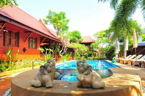 Outdoor pool, pool umbrellas, sun loungers