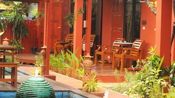 Pond View Villa | Minibar, in-room safe, blackout curtains, iron/ironing board