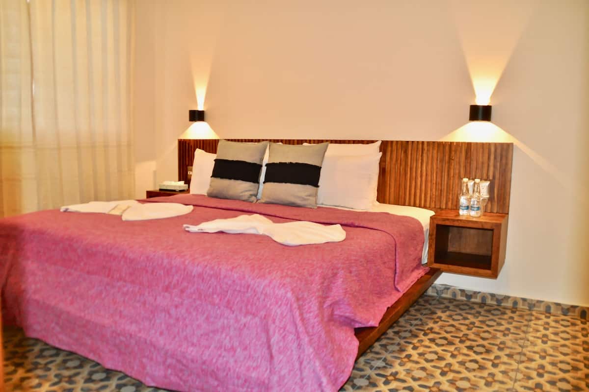Appartamento Junior, 1 letto king, angolo cottura, vista montagna | 1 camera, postazione laptop, ferro/asse da stiro, Wi-Fi gratuito