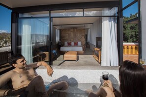 Design Studio Suite, 1 Bedroom, Terrace, City View | Laptop workspace, iron/ironing board, free WiFi, bed sheets - Hotel Casa del Sótano (Oaxaca)