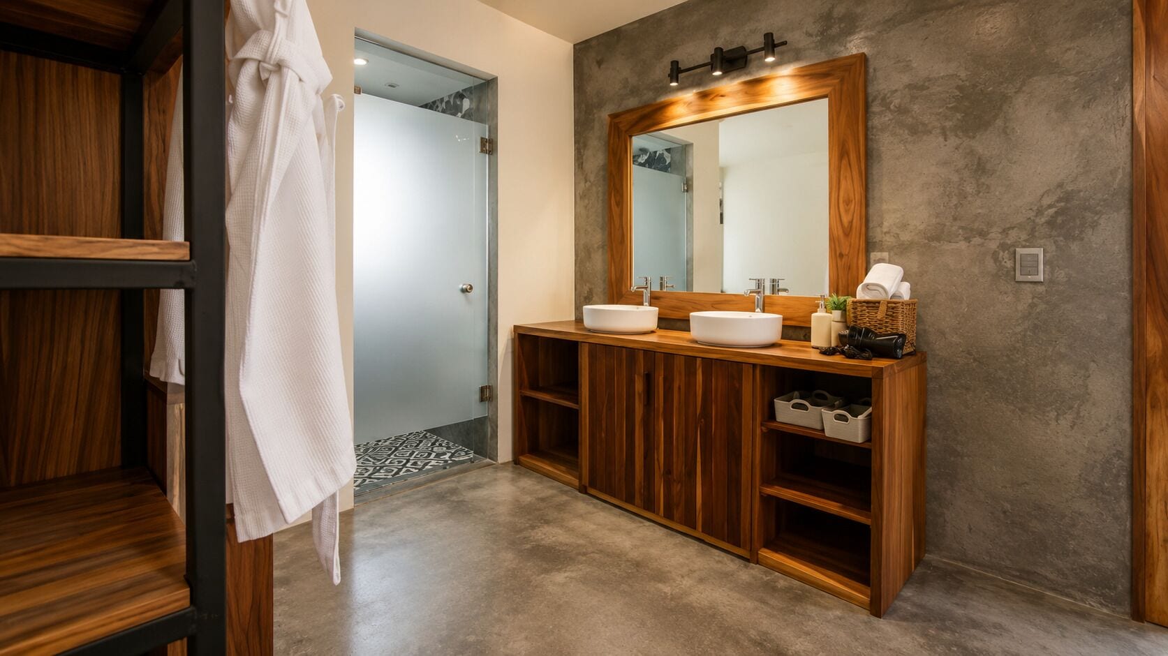 A bathroom with wooden cabinetry, two sinks, a large mirror, and a towel rack.
