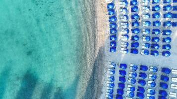 Private beach, free beach cabanas, sun loungers, beach umbrellas