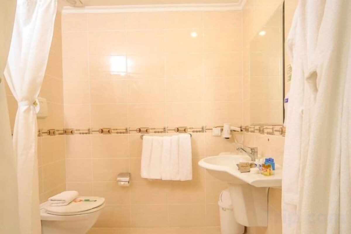 Bathroom | Shower, hair dryer, towels, soap