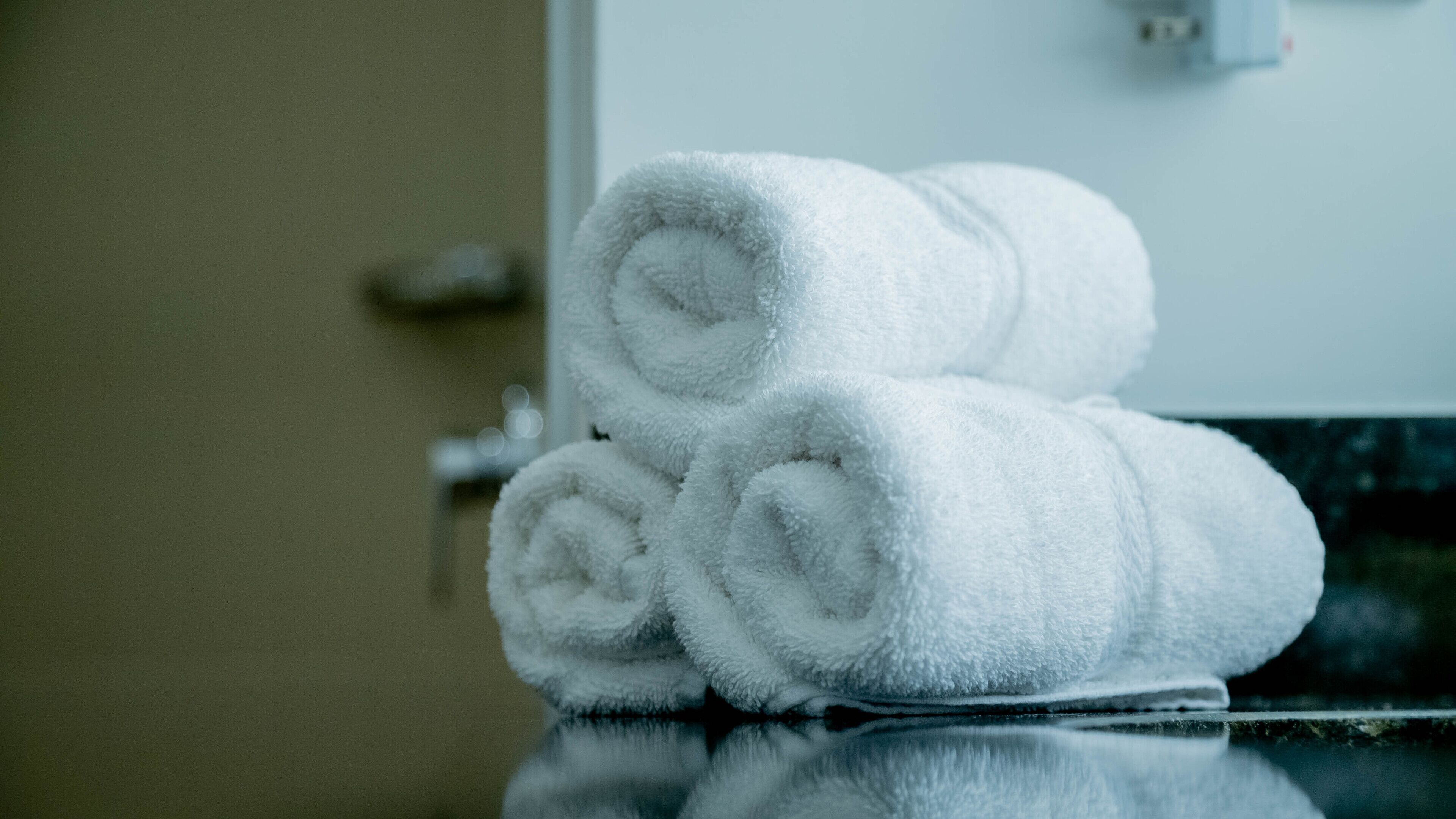 shower, rainfall showerhead, hair dryer, towels