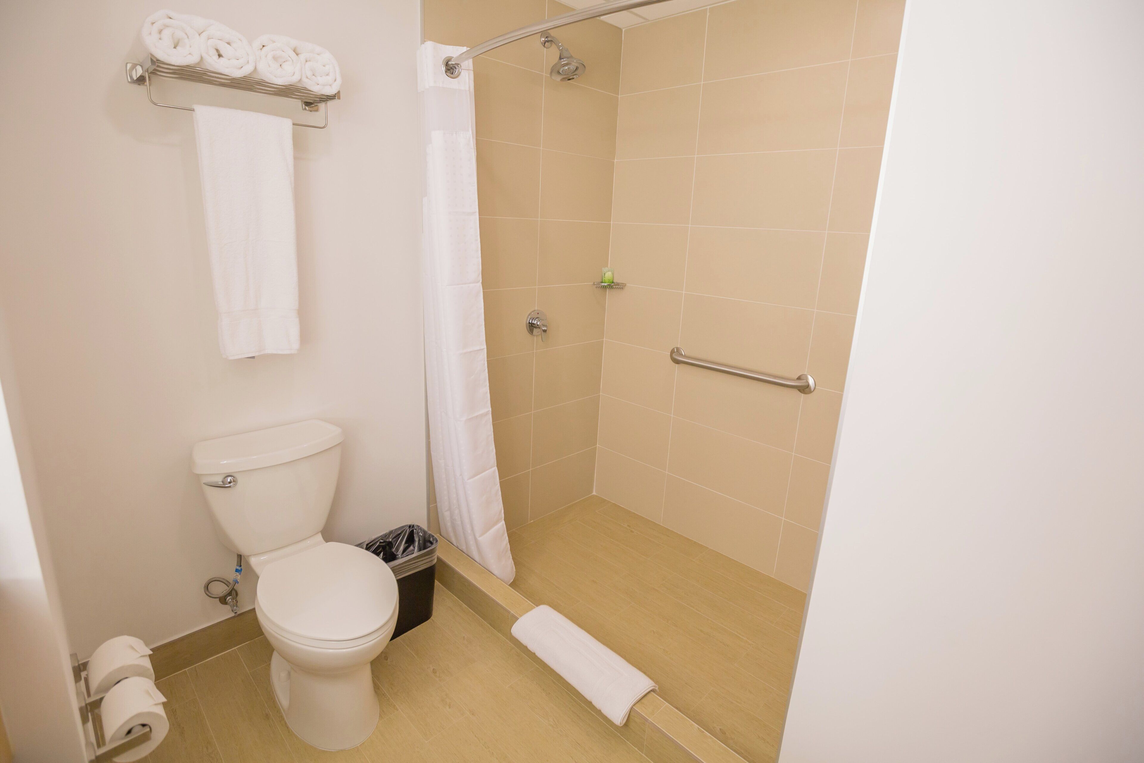 Shower, rainfall showerhead, hair dryer (on request), towels