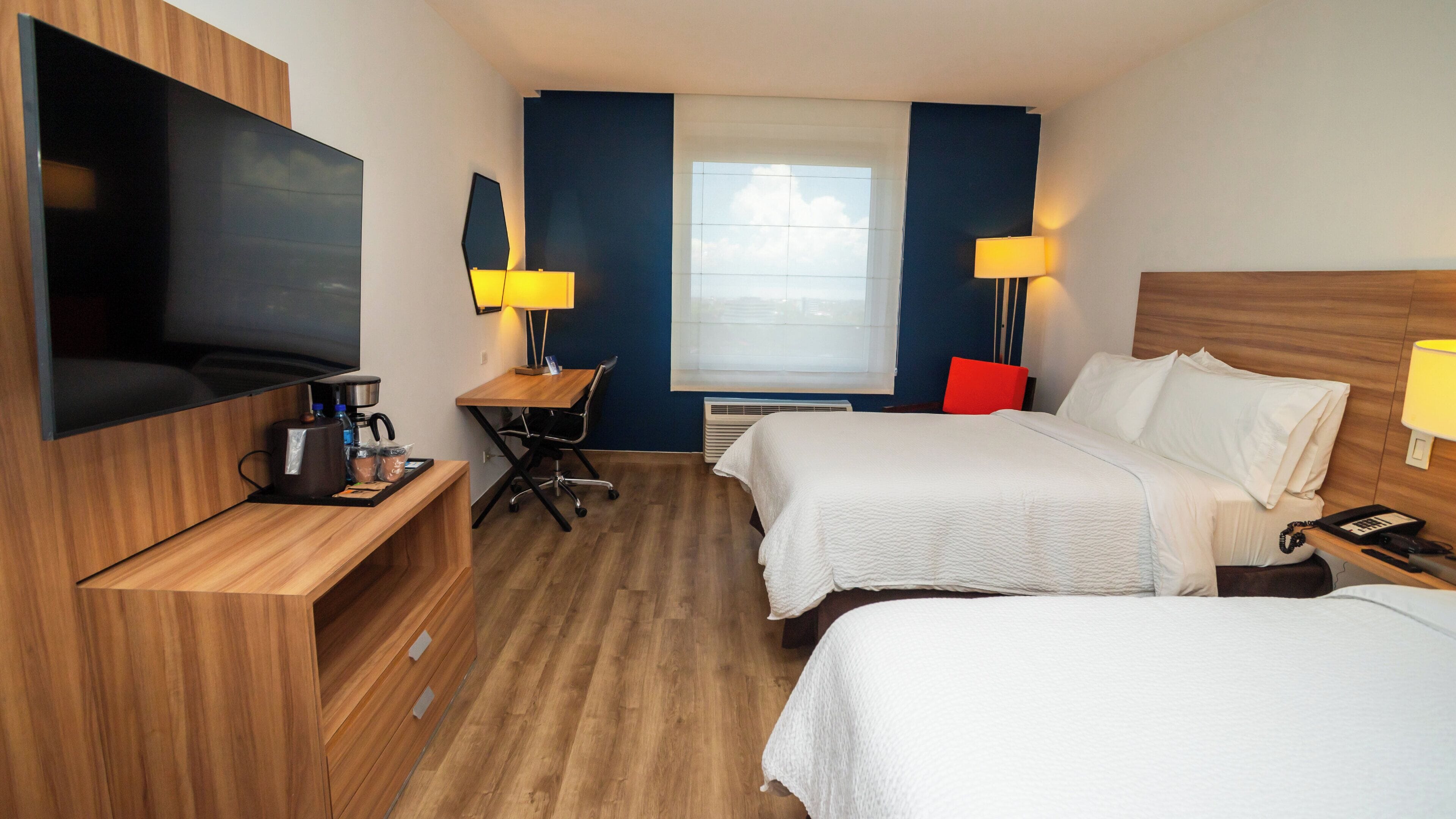 Hypo-allergenic bedding available, in-room safe, desk, laptop workspace