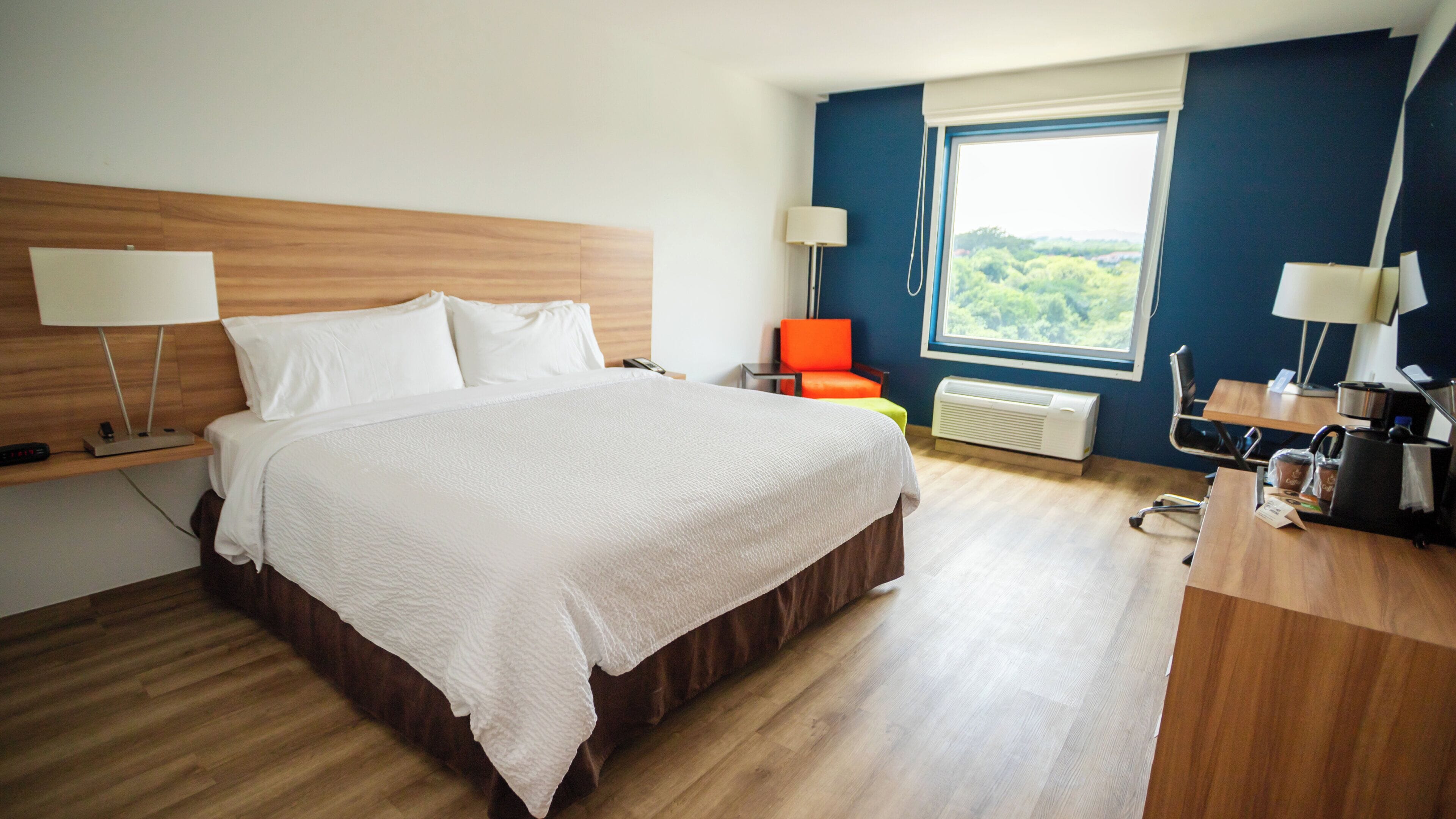 Hypo-allergenic bedding, in-room safe, desk, laptop workspace
