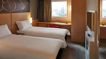 Standard Apartment, 2 Twin Beds | Minibar, in-room safe, desk, blackout drapes