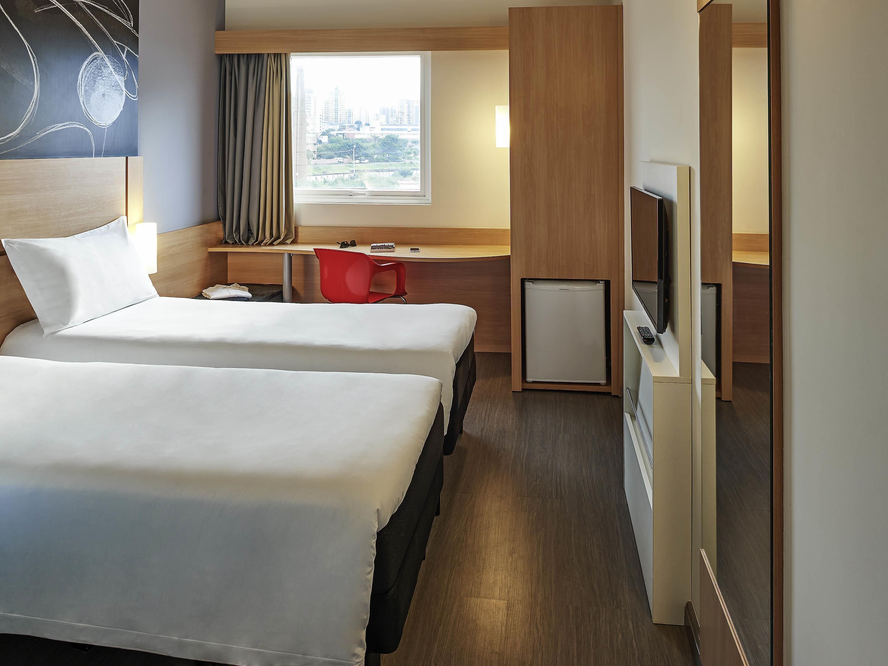 Standard Apartment, 2 Twin Beds | Minibar, in-room safe, desk, blackout drapes