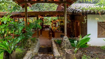 Breakfast, lunch, dinner served; local cuisine, garden views