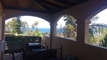 Premier Room, 1 King Bed, Hot Tub, Ocean View | Terrace/patio