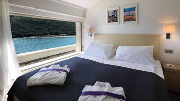 Superior Suite, Terrace, Sea View | Minibar, in-room safe, soundproofing, iron/ironing board
