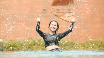 Outdoor pool, open 7:00 AM to 8:00 PM, pool loungers