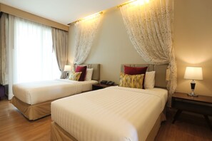 Deluxe Twin Room | Minibar, in-room safe, desk, blackout drapes - Le Patta Resort & Hotel Chiang Rai (Chiang Rai)