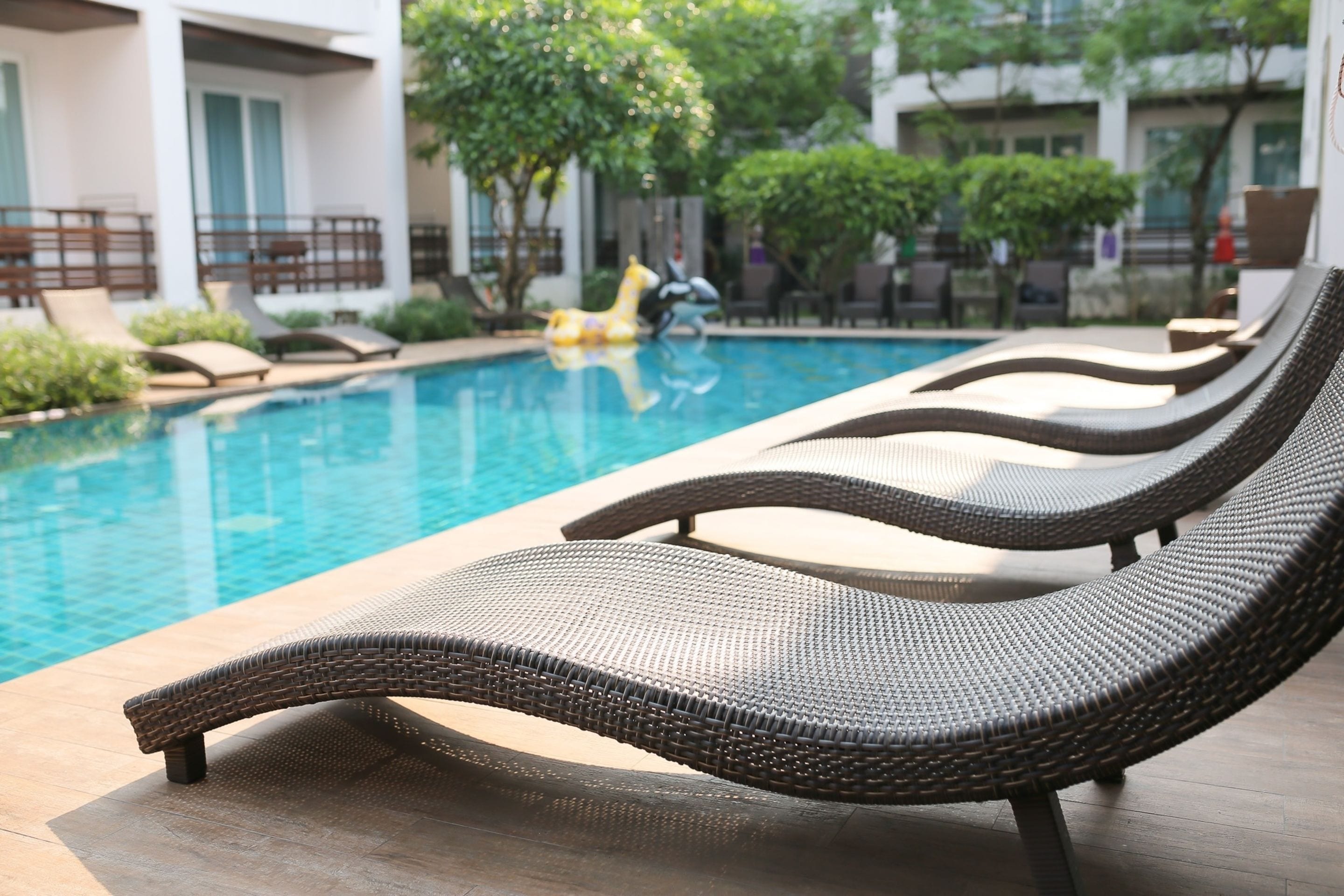 outdoor pool, open 7:00 am to 8:00 pm, pool loungers