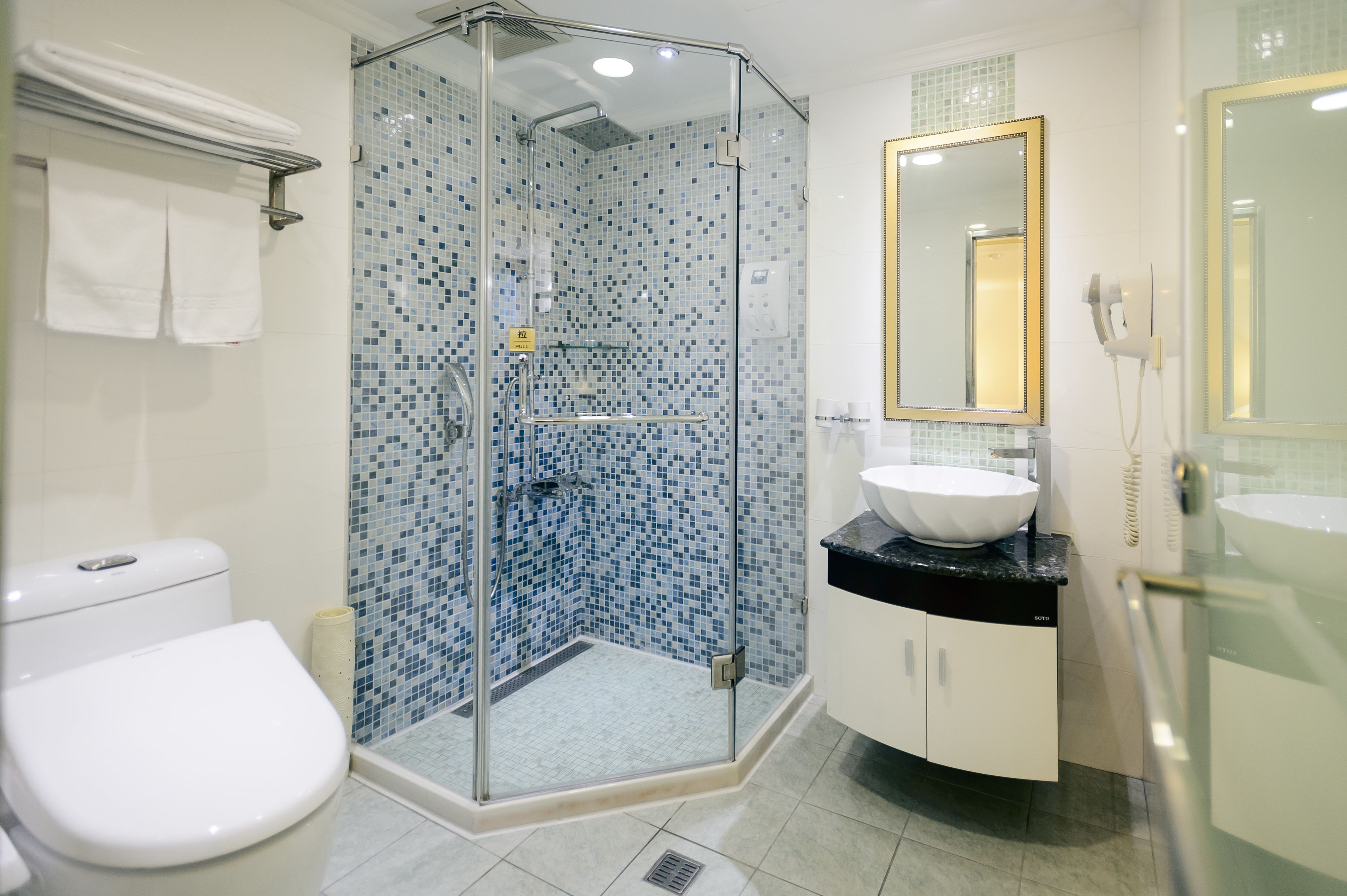 shower, rainfall showerhead, hair dryer, towels