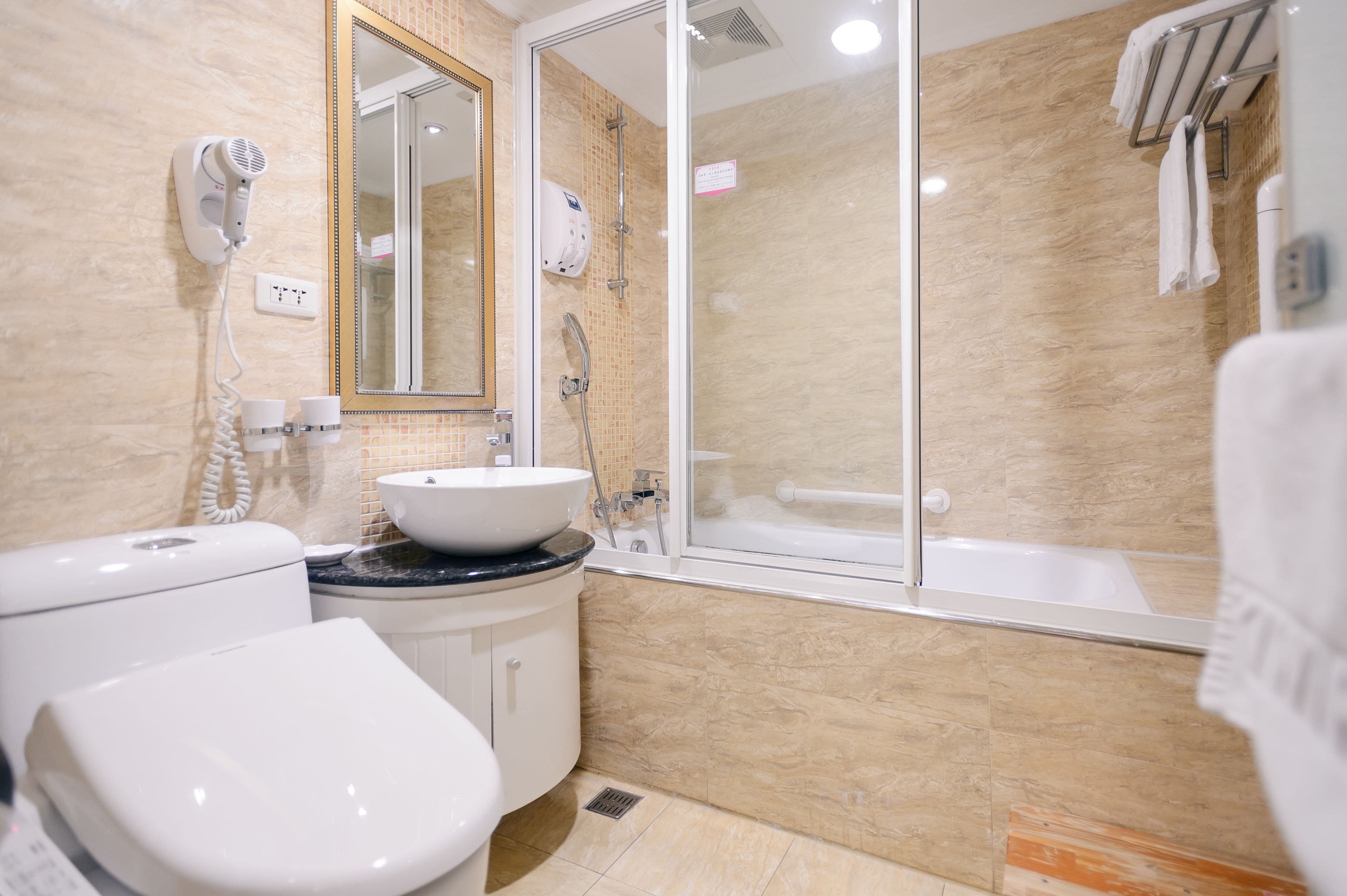 shower, rainfall showerhead, hair dryer, towels