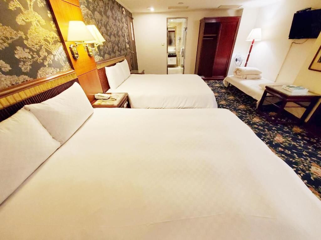 family room | down duvets, pillow-top beds, blackout curtains, soundproofing