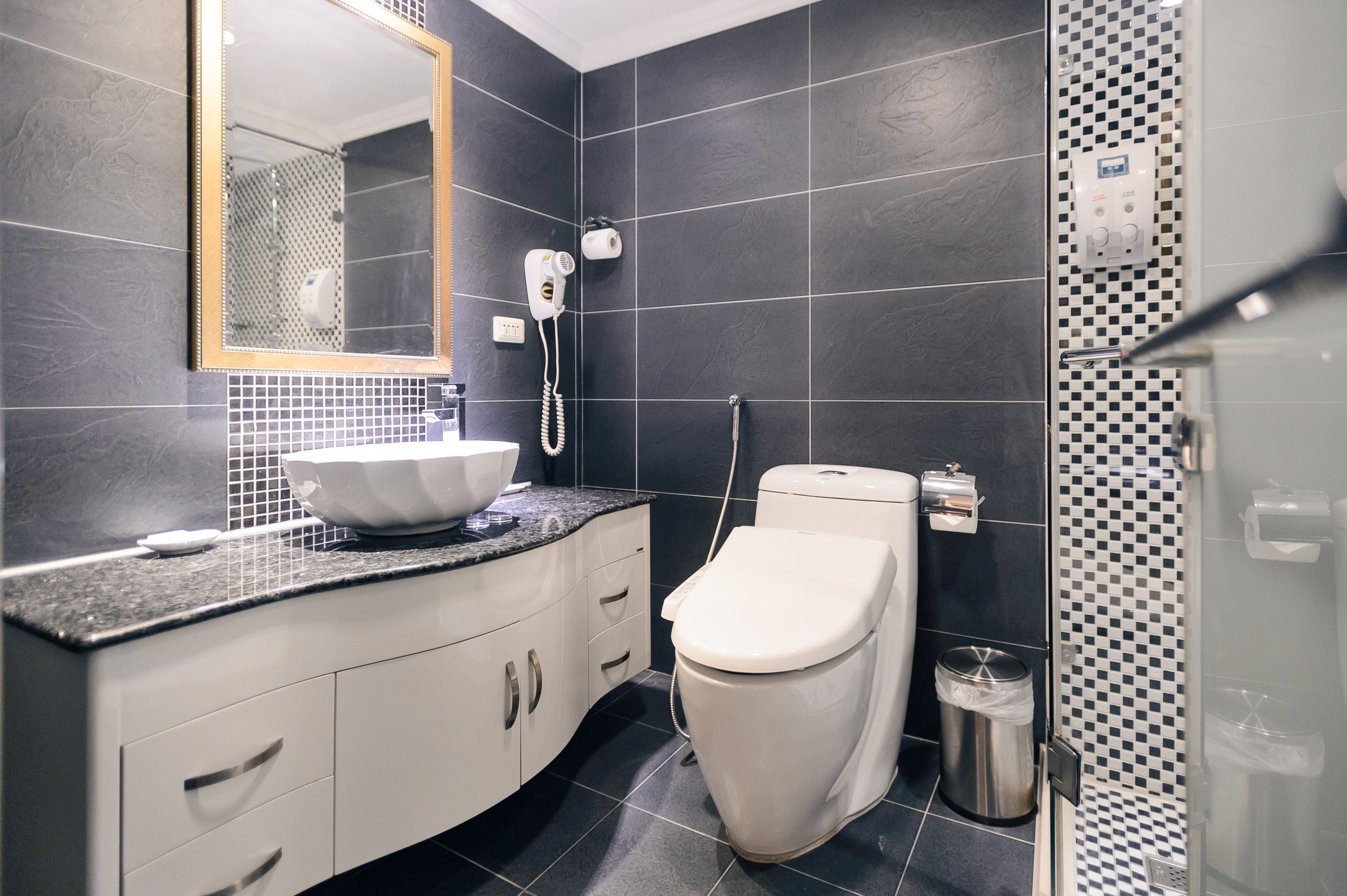 shower, rainfall showerhead, hair dryer, towels