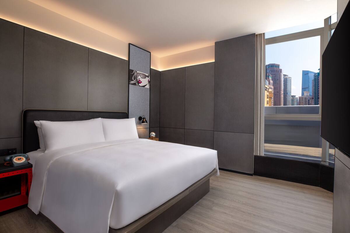Suite, 1 King Bed, Terrace, Garden View | Down comforters, in-room safe, blackout drapes, WiFi (free)