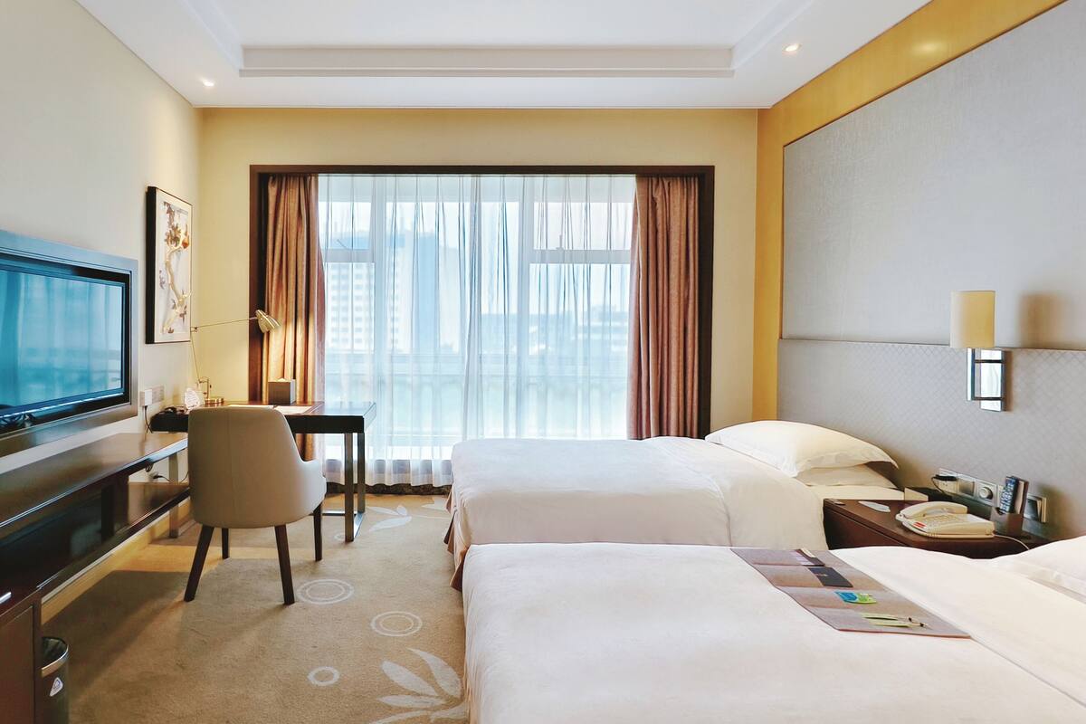 Elegand Twin Room | Premium bedding, in-room safe, individually decorated