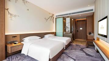 Premium bedding, down duvets, in-room safe, individually decorated