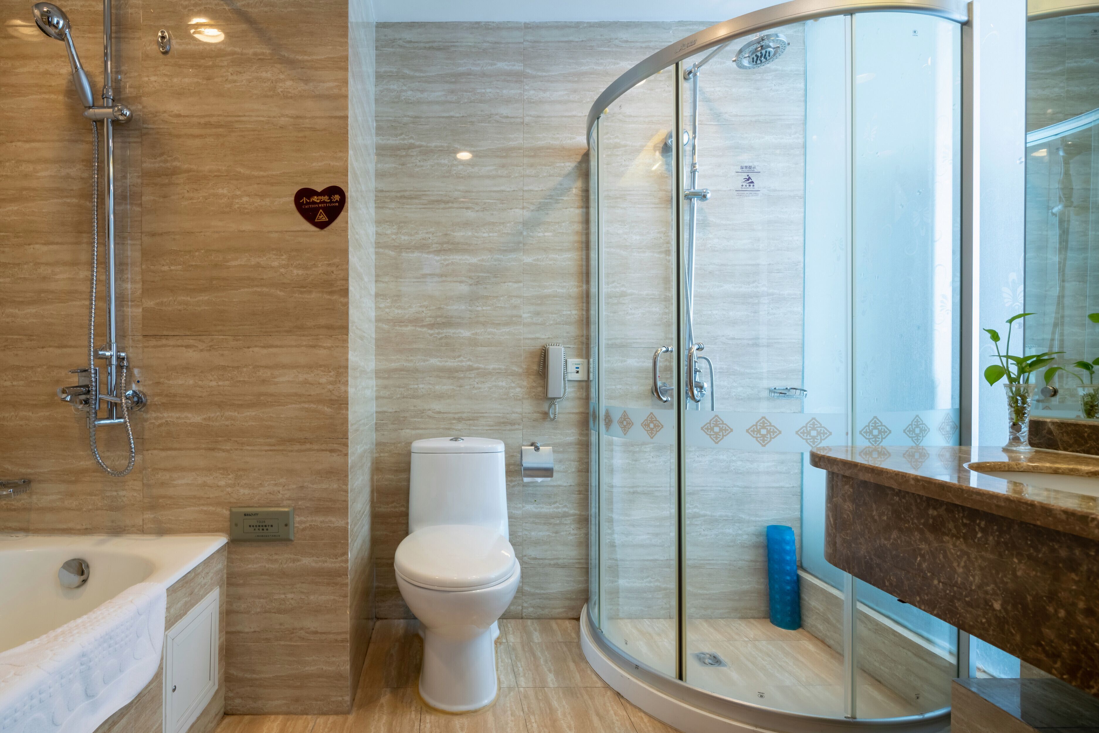 elite suite | bathroom | combined shower/bathtub, free toiletries, hair dryer, dressing gowns