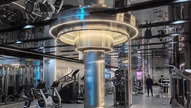 A modern gym with various exercise equipment, including treadmills and weight machines. - Dongyang Building (Dongyang Center Branch) (Dongyang)