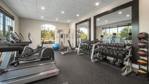 A gym with treadmills, dumbbells, and exercise balls. - Holiday Inn Express & Suites Aiken by IHG (Aiken)