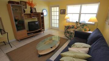 Apartment, 1 Bedroom (12B) | Living area | Flat-screen TV