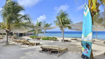 Una playa cerca, toallas de playa