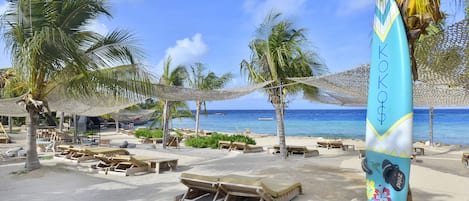 Una spiaggia nelle vicinanze, teli da spiaggia