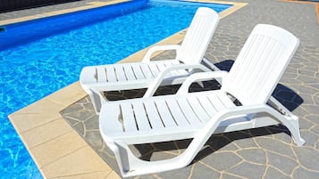 Outdoor pool, pool loungers