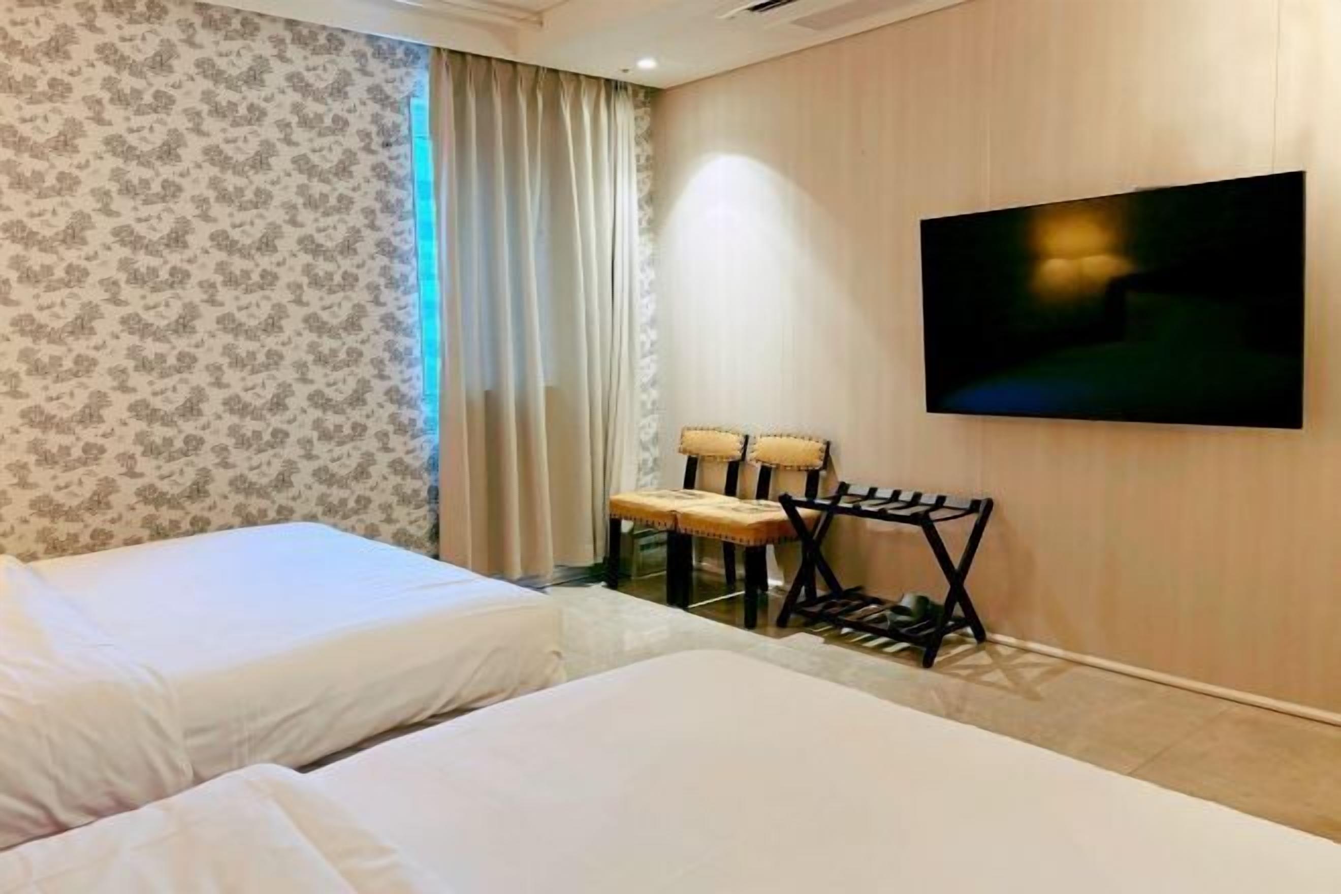 Premium bedding, down duvets, individually decorated