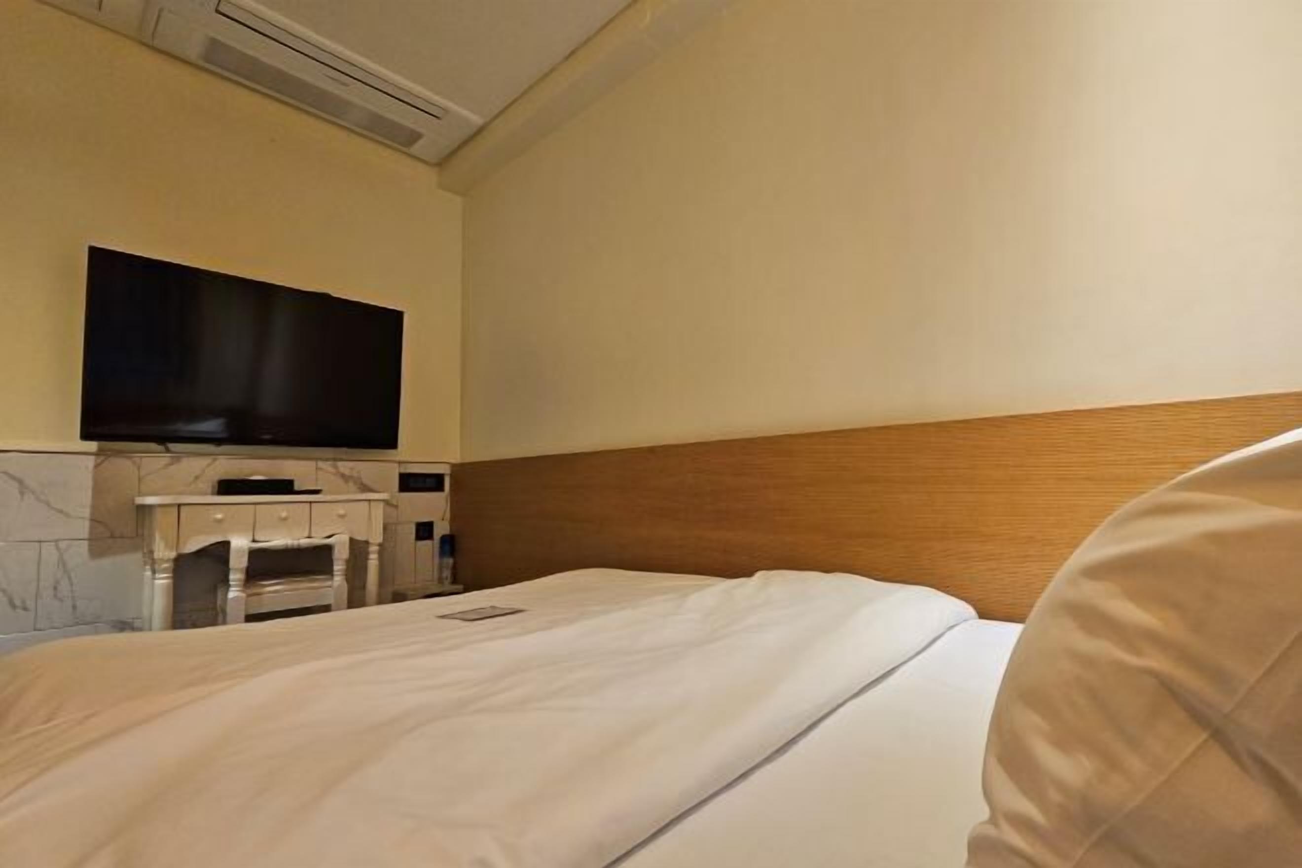 Premium bedding, down duvets, individually decorated