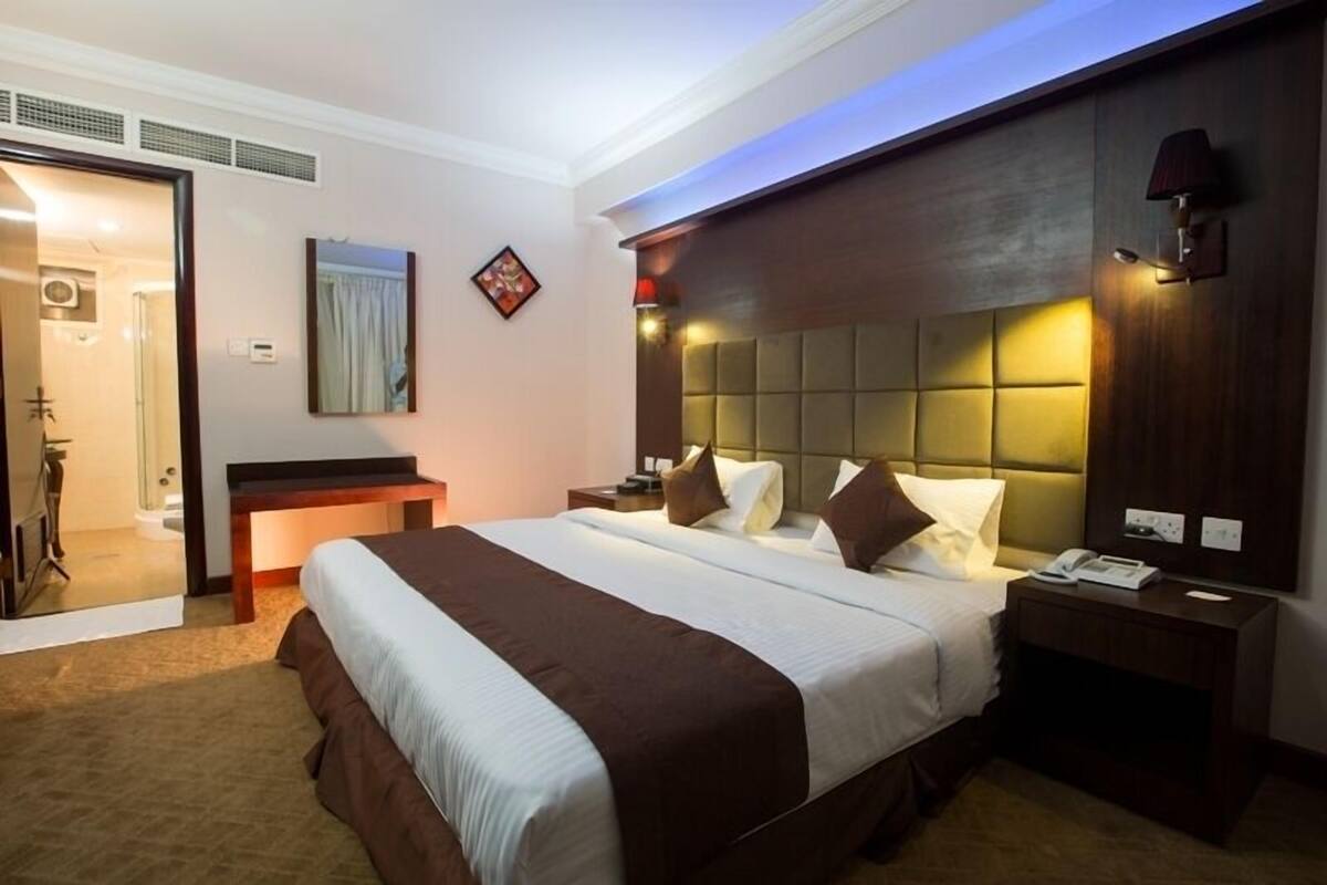 Deluxe Room | 1 bedroom, minibar, in-room safe, desk