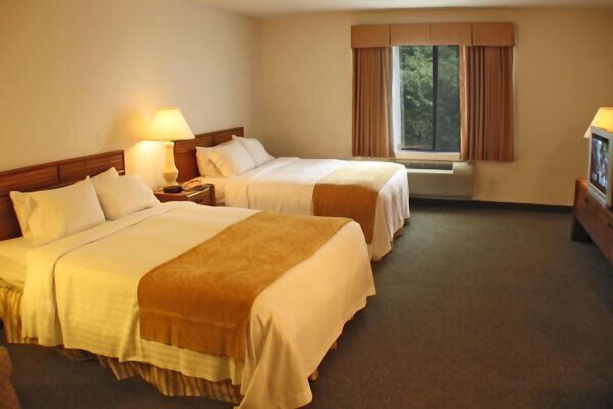 Premium bedding, desk, blackout drapes, iron/ironing board