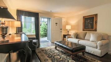 Suite, 1 Queen Bed with Sofa bed | Living area | 50-inch flat-screen TV with satellite channels, TV, iPod dock