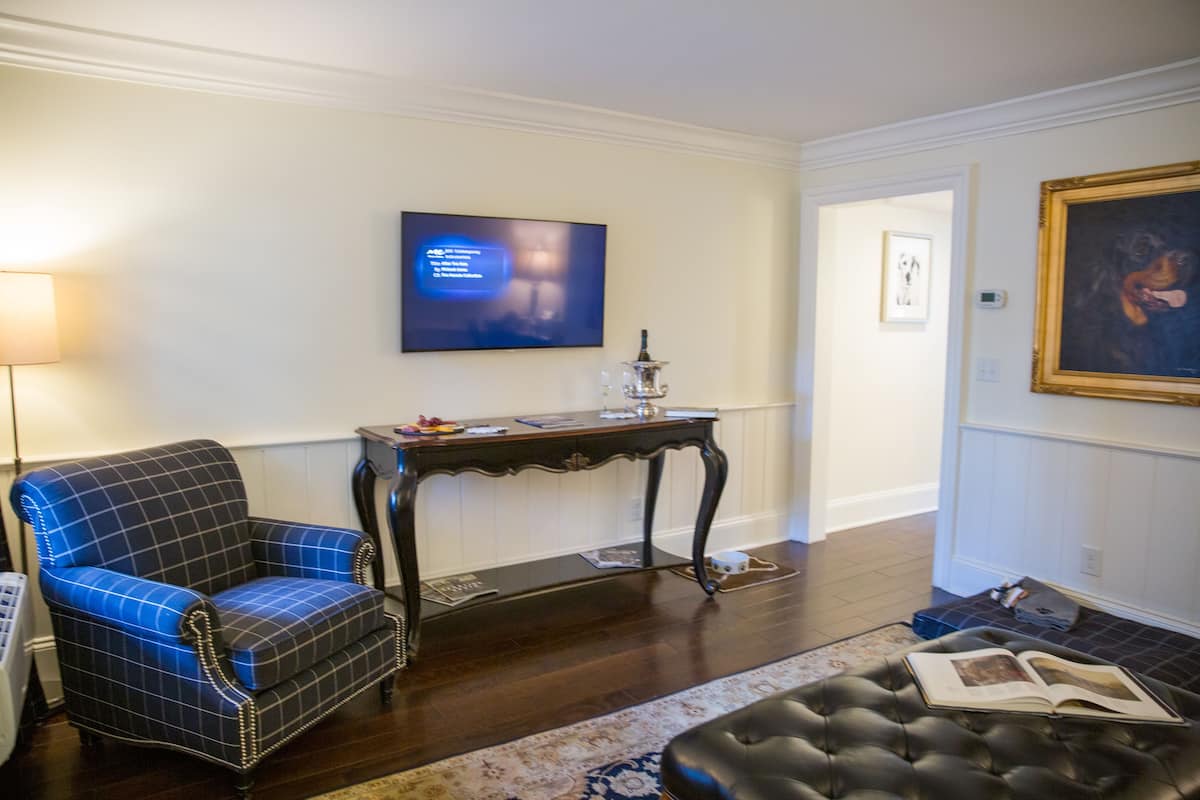 Suite, 1 King Bed with Sofa bed | Living area | 50-inch flat-screen TV with satellite channels, TV