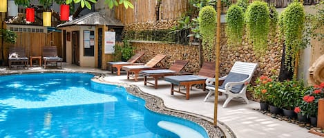 Outdoor pool, sun loungers