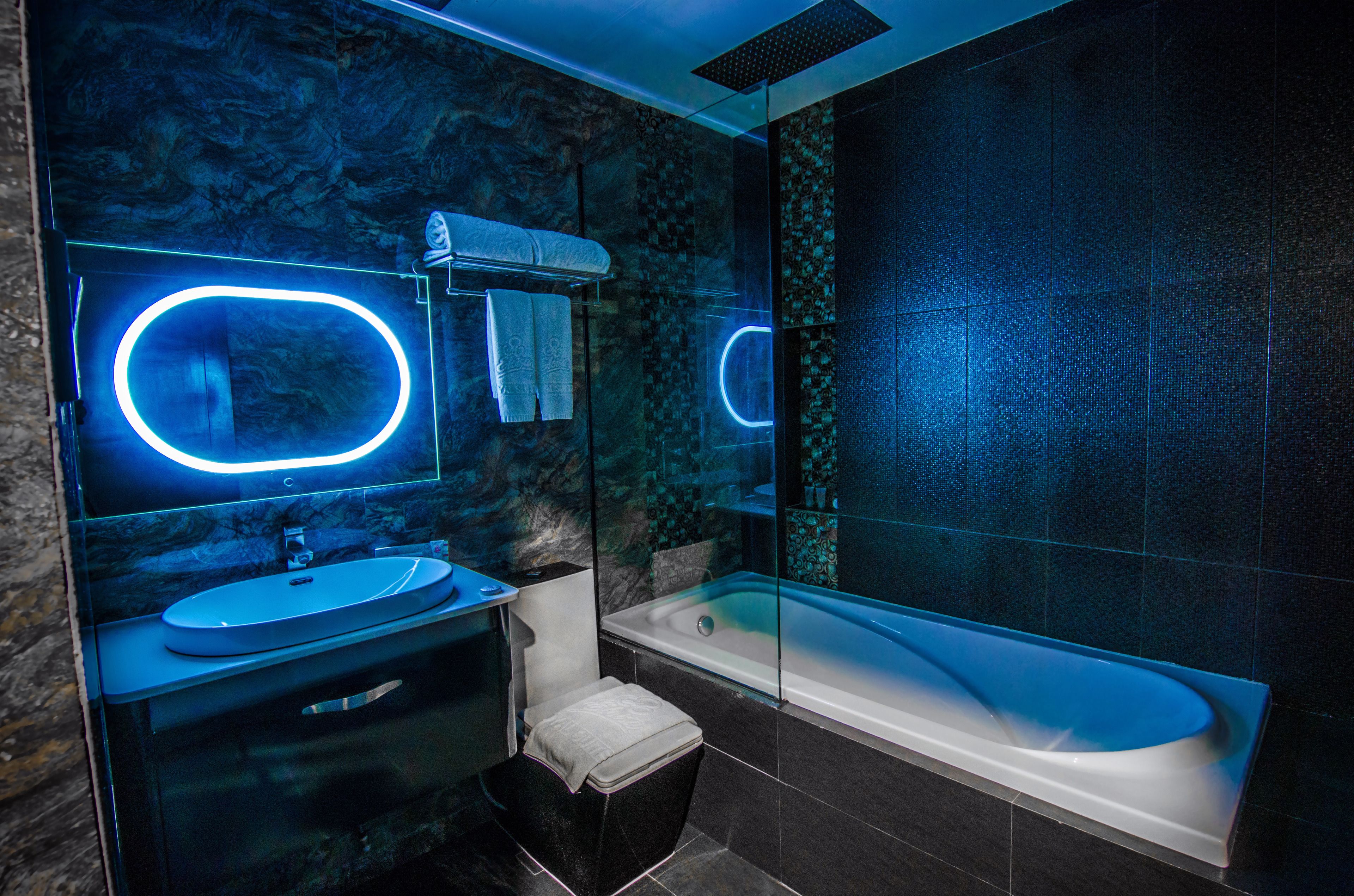 executive room, 2 double beds | bathroom | shower, rainfall showerhead, free toiletries, hair dryer